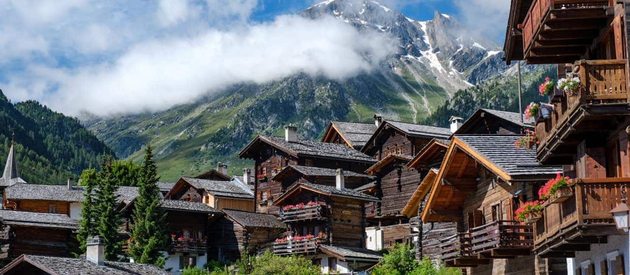 Sun-blackened timber chalets in the Alpine village of Grimentz, Valais
