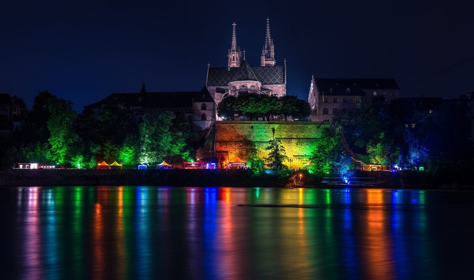 The Rhine at Basel with the red-sandstone Münster, evoking pharma and culture
